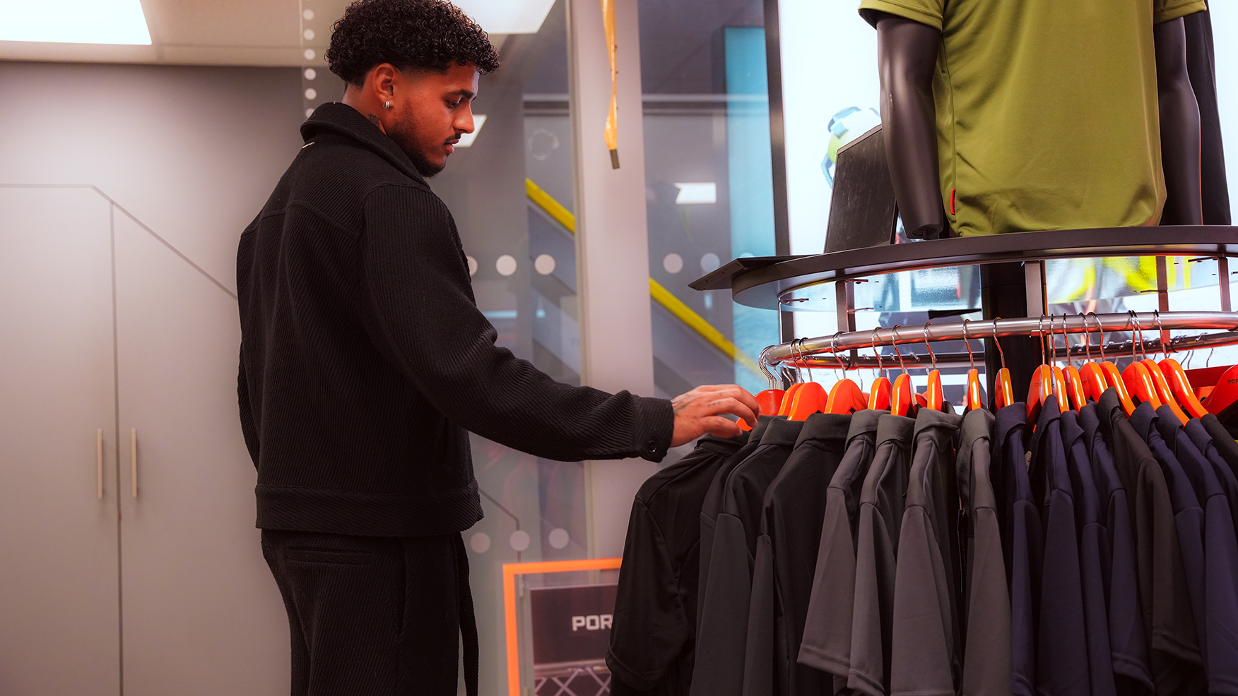 Customer browsing workwear inside Workwear Supermarket